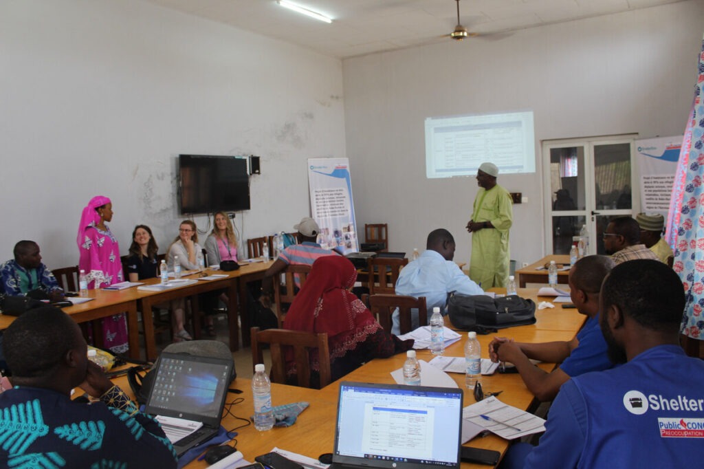 People in a meeting in a room in Cameroon
