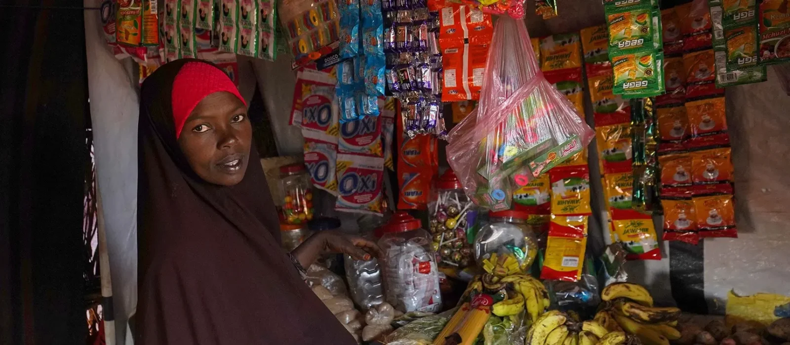 Lady sitting in bazaar