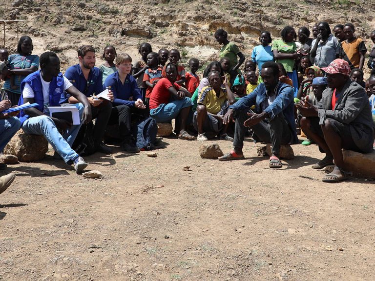 People in Ethiopia sitting and talking