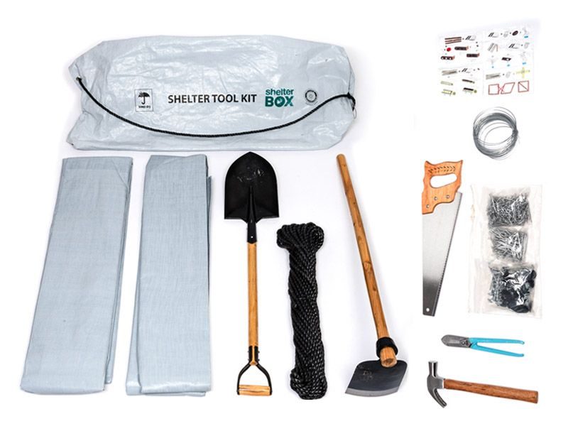 ShelterKit and its contents: tarpaulins, shovel, rope, hoe, tools